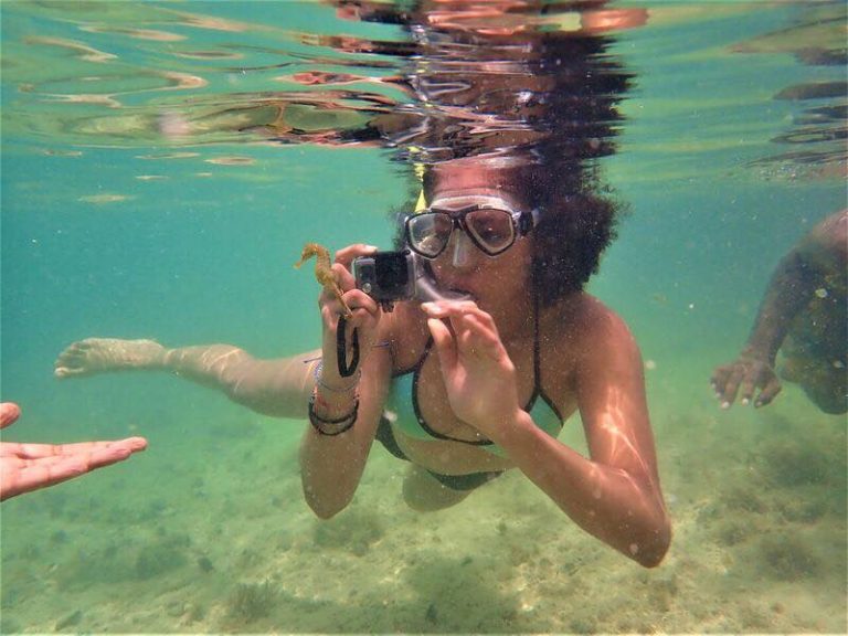 Zoe snorkelling in a clear waters